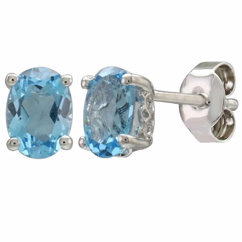 Ladies modern earrings-14K White Gold 1.69ctw Oval Swiss Blue Topaz Stud Earrings