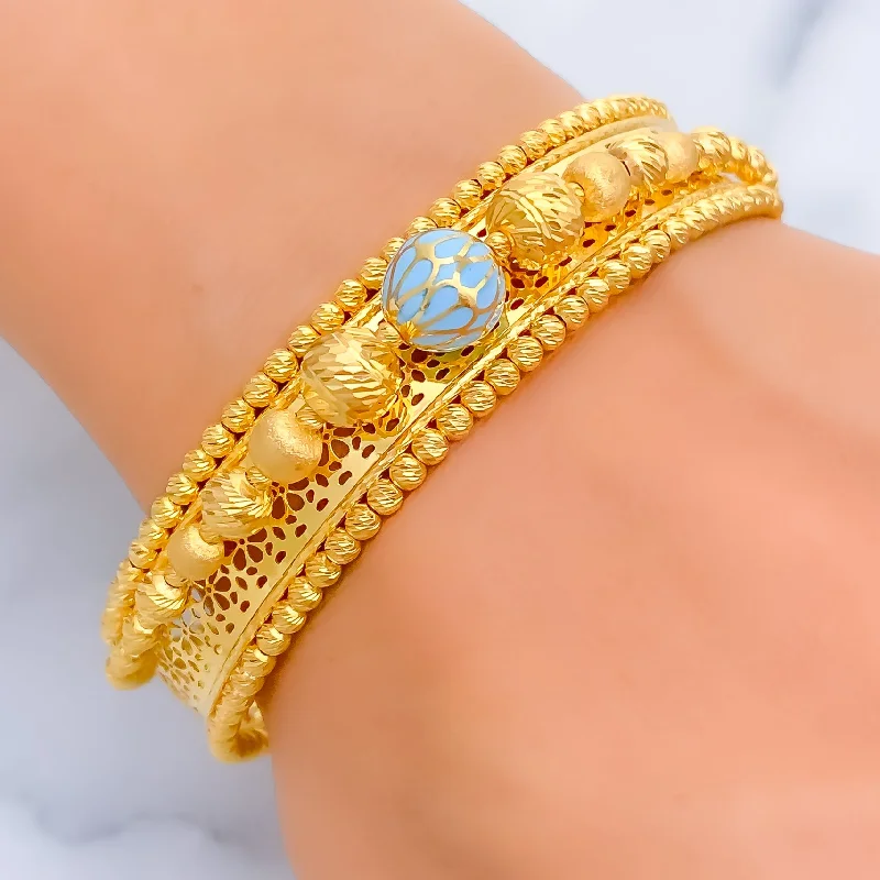 Ladies gemstone bracelets-Mesmerizing Vibrant 21K Gold Bangle Bracelet