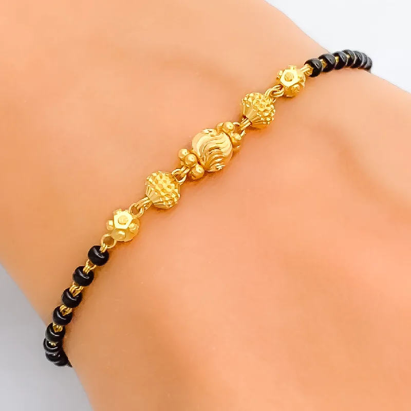 Ladies fashion bangles-Shimmering Graceful 22k Gold Black Bead Bracelet