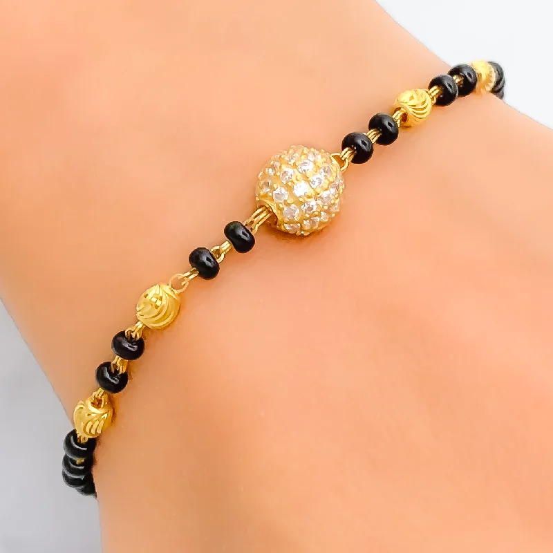 Ladies gold and silver bangles-Beautiful Orb 22k Gold Black Bead CZ Bracelet