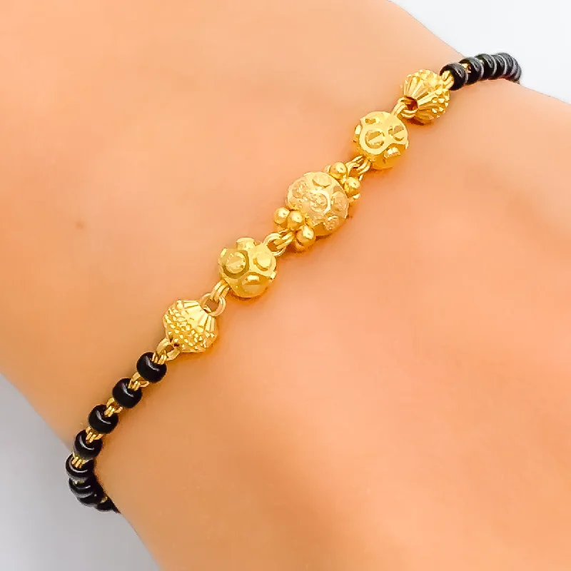 Ladies designer bracelets-Attractive Dazzling 22k Gold Black Bead Bracelet