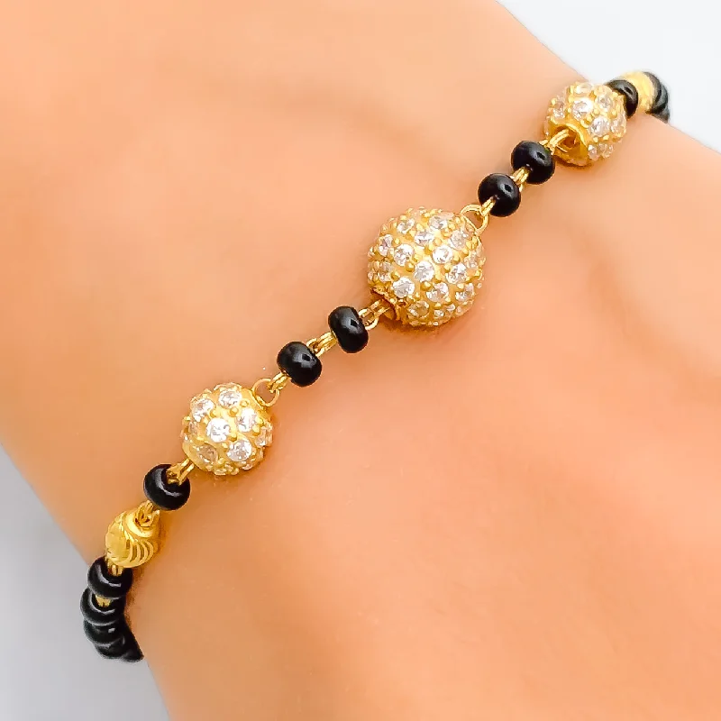 Ladies engraved charm bracelets-Shiny Refined 22k Gold Black Bead CZ Bracelet