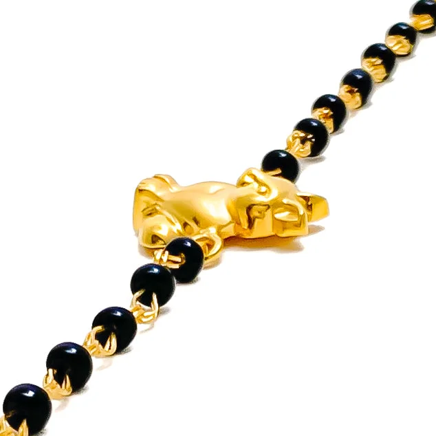 Ladies cubic zirconia bracelets-Charming Ethereal 22k Gold Black Bead Baby Bracelet