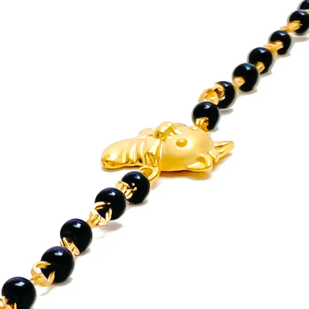 Ladies leather charm bracelets-Fashionable Ornate 22k Gold Black Bead Baby Bracelet